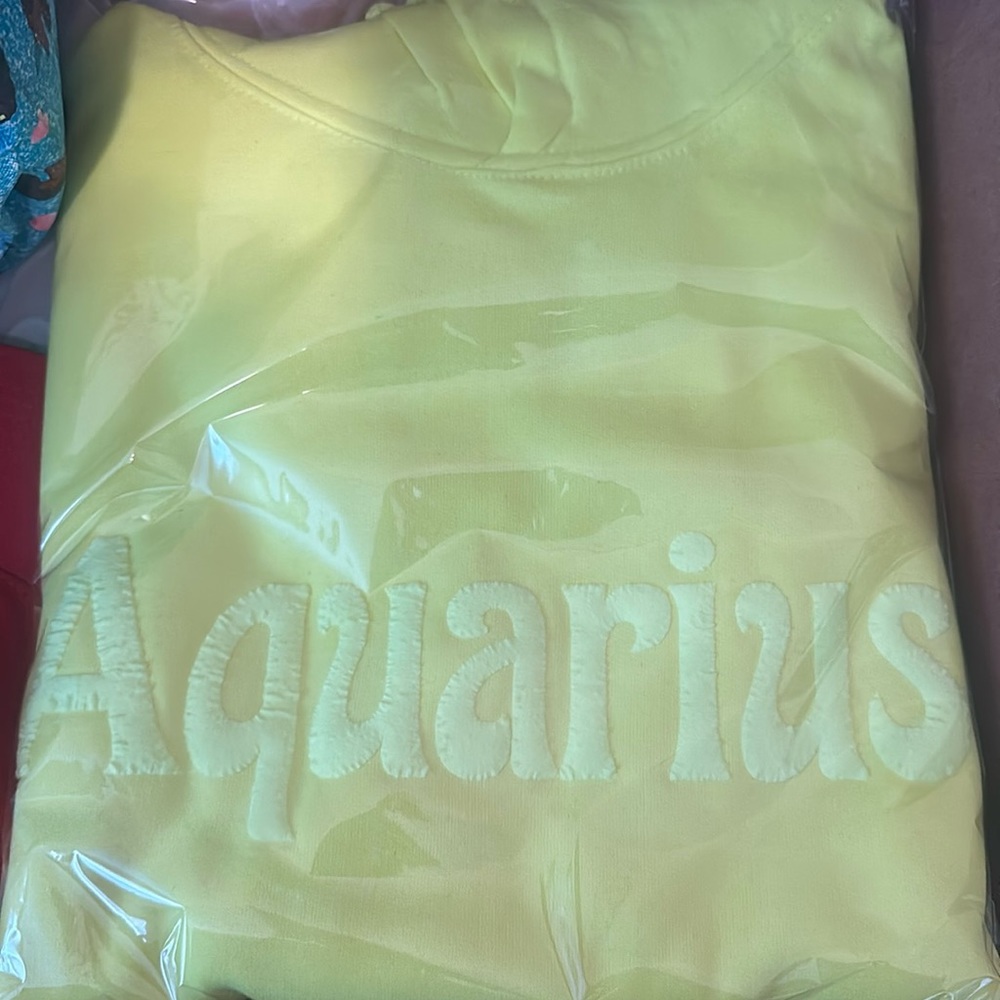 Bright yellow Aquarius hoodie